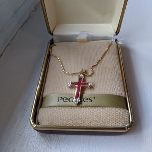 Cross necklace on gold chain